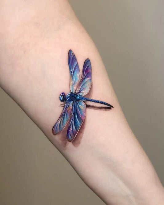 Medium Realism Dragonfly on Women Arm Tattoo by @tattooist_yum