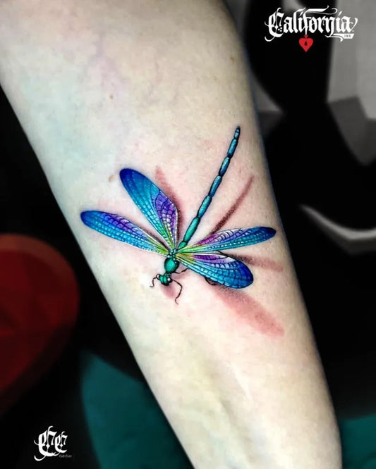 Medium Realism Dragonfly with Shadow on Women Arm Tattoo by @californiainktattoobangkok