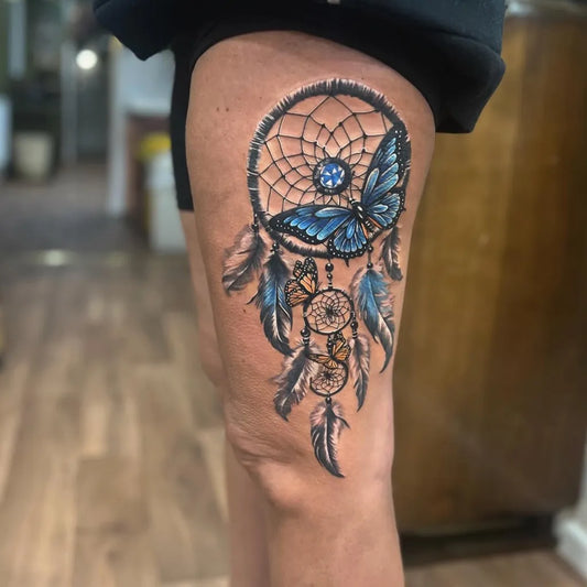 Medium Realism Dream Catcher Butterfly Tattoo on Women Thigh by @robromane