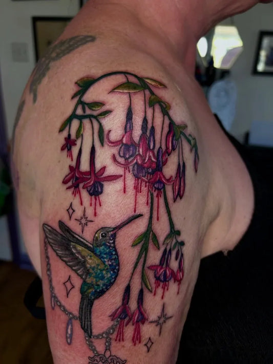 Medium Realism Hummingbird Fuchsia Flowers on Women Shoulder Tattoo by @rosalieroycetattoo