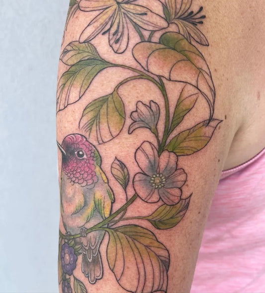 Medium Realism Hummingbird and Lilies on Women Arm Tattoo by @crowwleysart