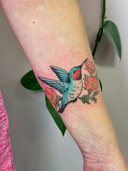 Medium Realism Hummingbird and Poppies on Women Arm Tattoo by @moderngoddesspdx