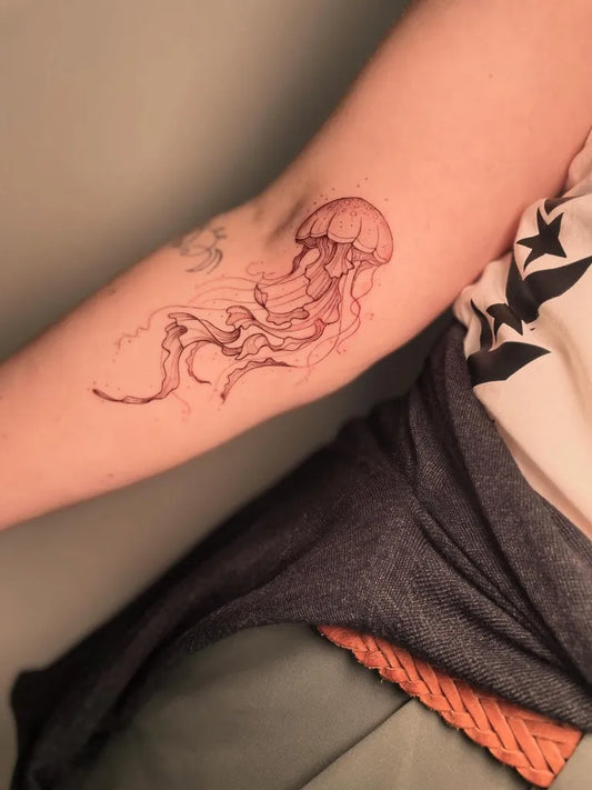 Medium Realism Jellyfish Tattoo on Women Arm by @minuetta.ttt