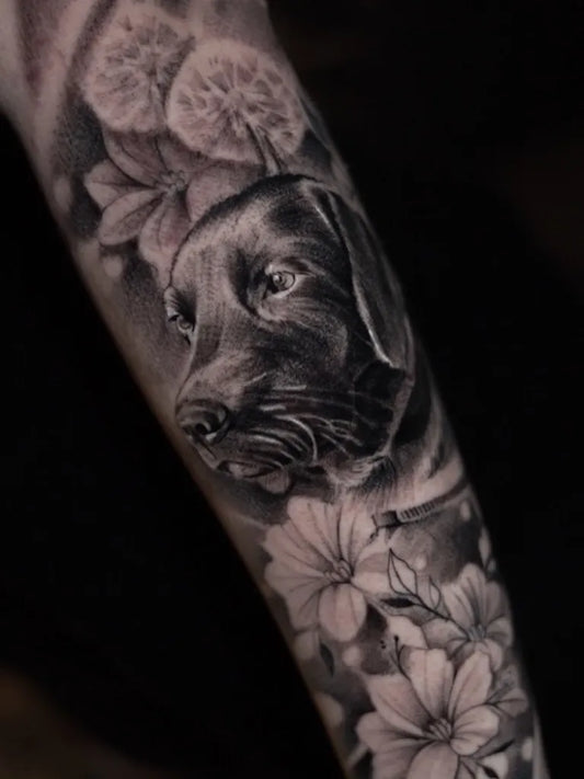 Medium Realism Labrador Dandelion Flowers Tattoo on Men Arm by @nanutattoo