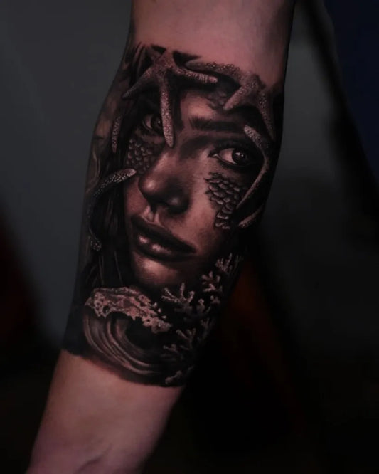Medium Realism Mermaids Face Tattoo on Women Arm by @kresta.tattoo