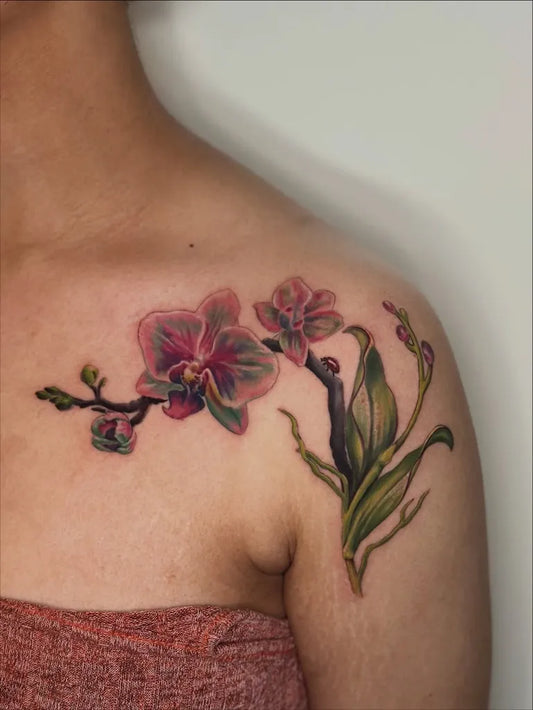 Medium Realism Orchid Flowers Tattoo on Women Shoulder by @graceeckerttattoos