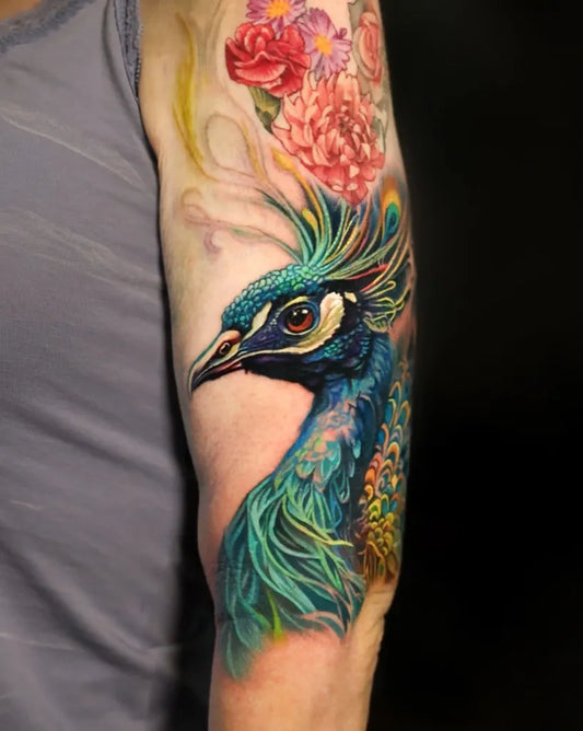 Medium Realism Peacock and Roses Tattoo on Women Arm by @rember_tattoos