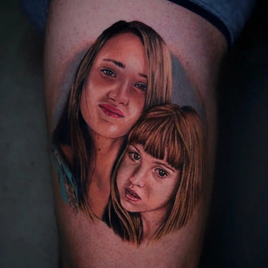 Medium Realism Portrait of Mother and Daughter Family Tattoo on Women Thigh by @giovannicaruso.tattooer