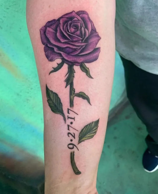 Medium Realism Purple Rose with Stem and Date Military Tattoo on Women Arm by @tnttattoo_aiea