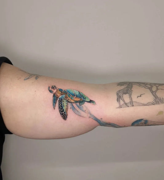 Medium Realism Sea Turtle Tattoo on Women Arm by @nancy_dongtattoo
