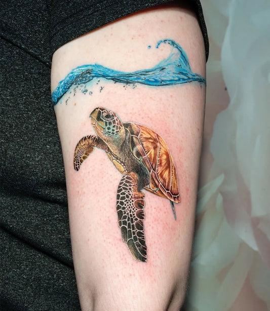 Medium Realism Sea Turtle Waves Tattoo on Women Arm by @renytattoos