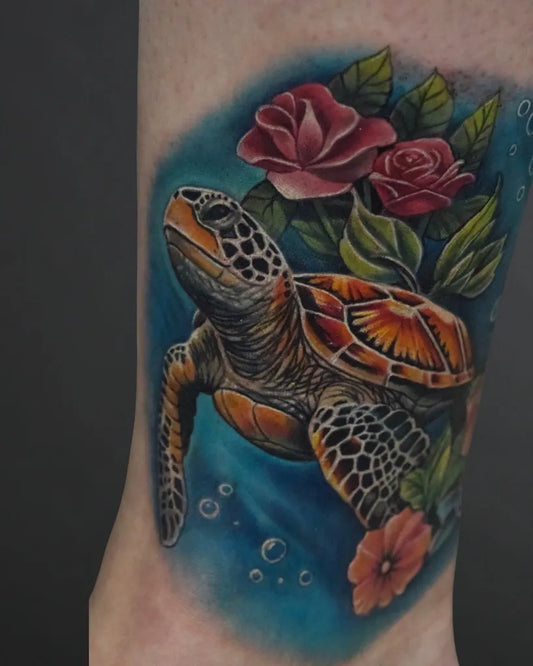 Medium Realism Sea Turtle with Roses Tattoo on Women Ankle by @redarttattoopiercing