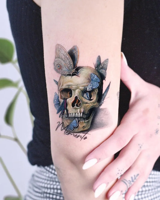 Medium Realism Skull with Butterflies on Women Arm Tattoo by @edit_paints