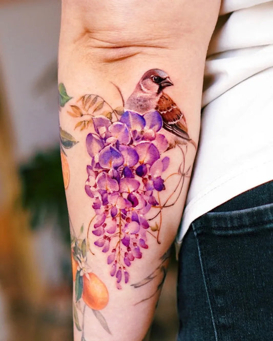 Medium Realism Sparrow Wisteria Leaves Tattoo on Women Arm by @abii_tattoo