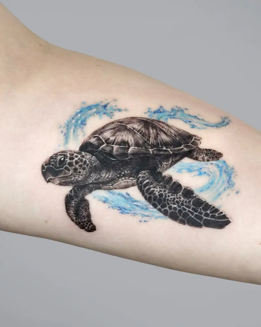 Medium Realism Turtle with Waves Tattoo on Women Arm by @orot_tattoo