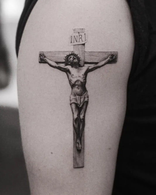 Medium Realistic Crucifixion on Men Arm Tattoo by @nemo.tattooist
