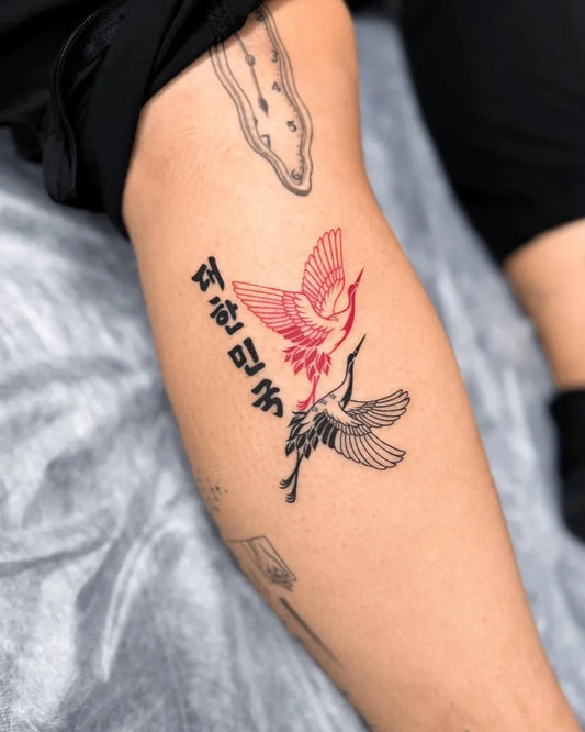 Medium Red Crane Tattoo on Women Thigh by @offtattooer