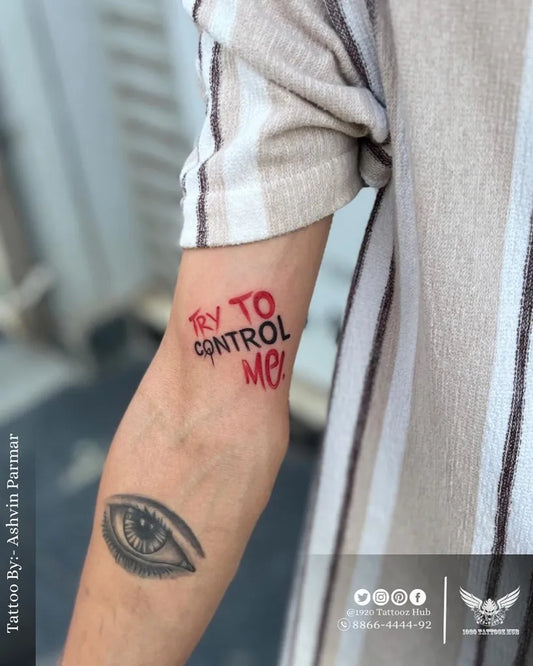 Medium Red Ink Text and Eye on Men Arm Tattoo by @1920tattoozhub