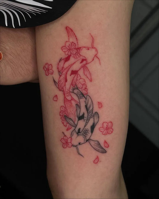 Medium Red Koi and Cherry Blossoms Tattoo on Women Thigh by @inkbytheresa
