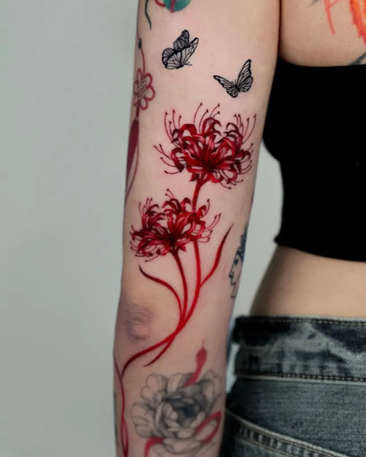 Medium Red RedSpiderLilies Tattoo on Women Arm by @nana.orient