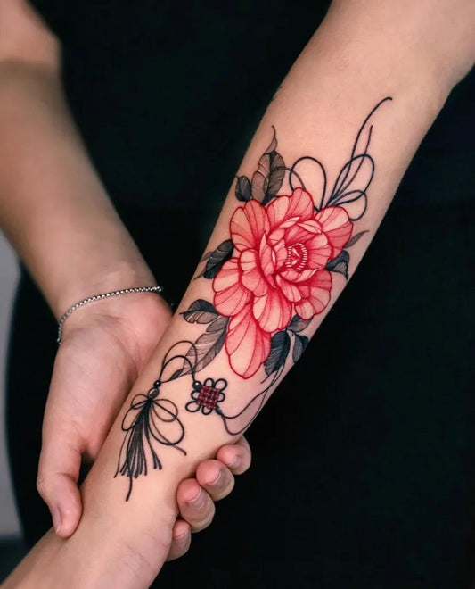 Medium Red Rose with Ribbon Tattoo on Women Arm by @zeeyeart