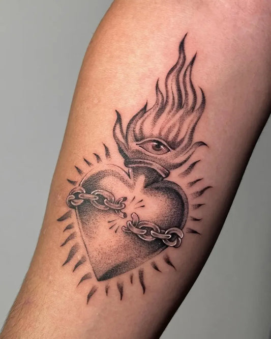 Medium Sacred Heart Heart Eye Flames on Men Arm Tattoo by @serrattto_