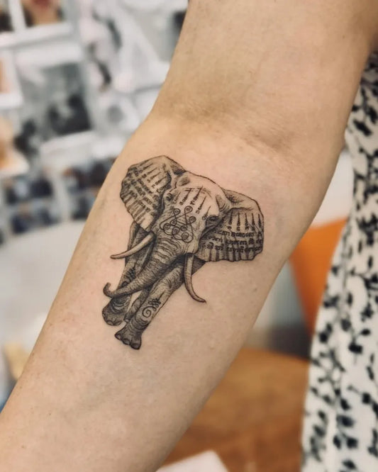 Medium Sak Yant Elephant Tattoo on Women Arm by @bnanatattoo