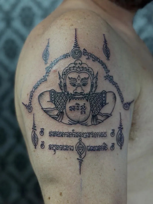 Medium Sak Yant Garuha Yant Tattoo on Men Shoulder by @preservation_khmer_sakyant