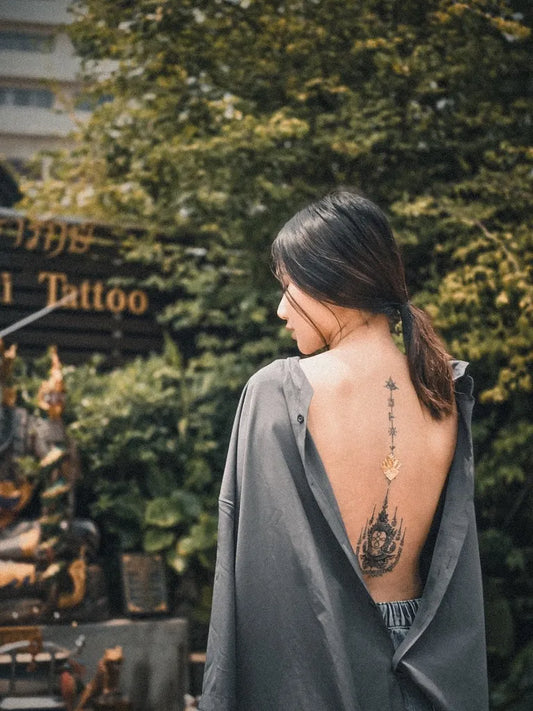 Medium Sak Yant Haehaew Yant Tattoo on Women Back by @arjannengthaisakyant