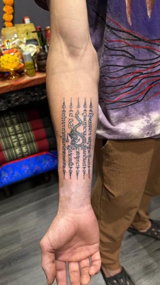 Medium Sak Yant Hah Taew Tattoo on Men Arm by @lantattooink