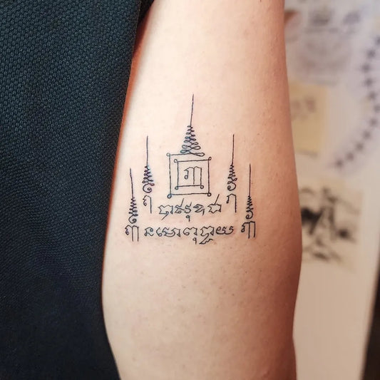 Medium Sak Yant Hoo Dao Script Tattoo on Men Arm by @nomoreinktattoo