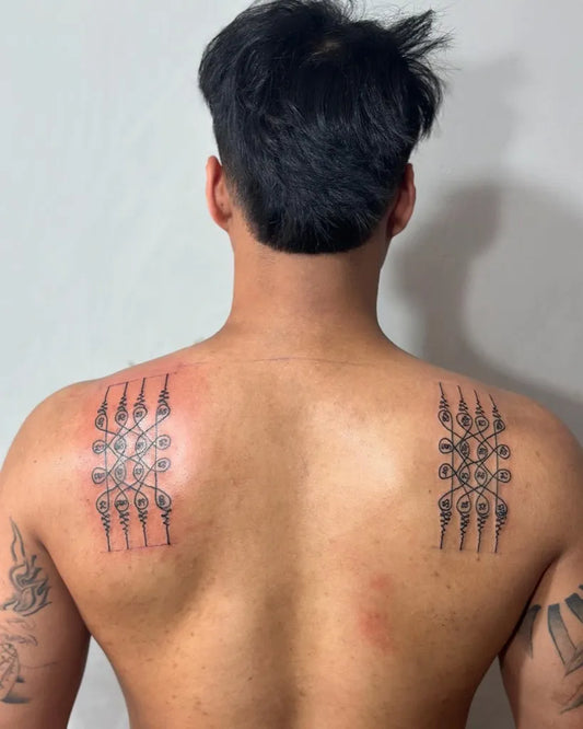 Medium Sak Yant Horizontal Yantra Bars Tattoo on Men Back by @preservation_khmer_sakyant
