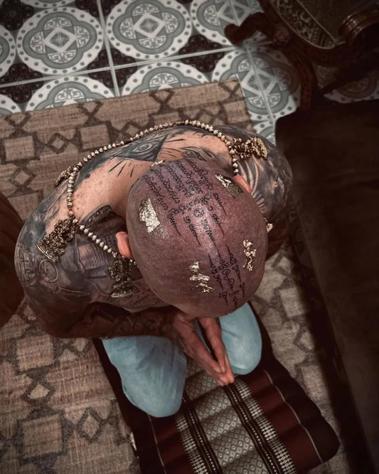 Medium Sak Yant Sak Yant Script Tattoo on Men Head by @indigena.tattoo