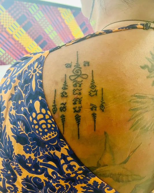 Medium Sak Yant Sak Yant Script Tattoo on Women Back by @vemfazerdireitoo