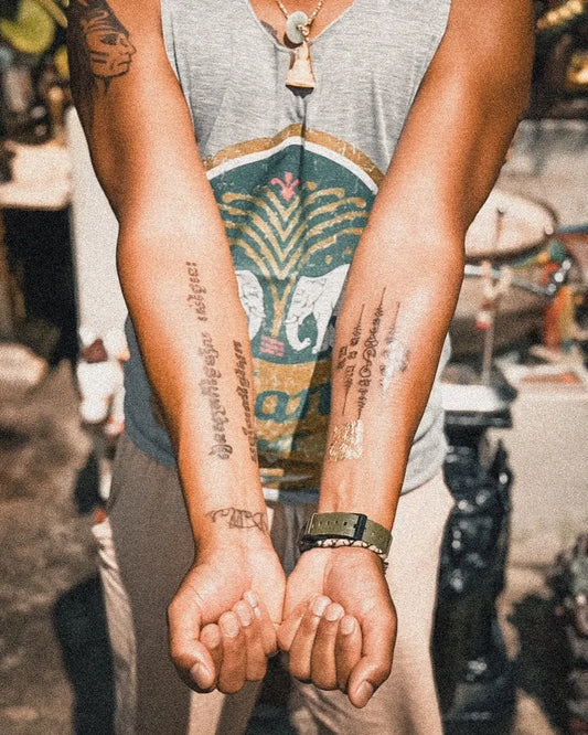 Medium Sak Yant Script Tattoo on Men Arms by @arjannengthaisakyant