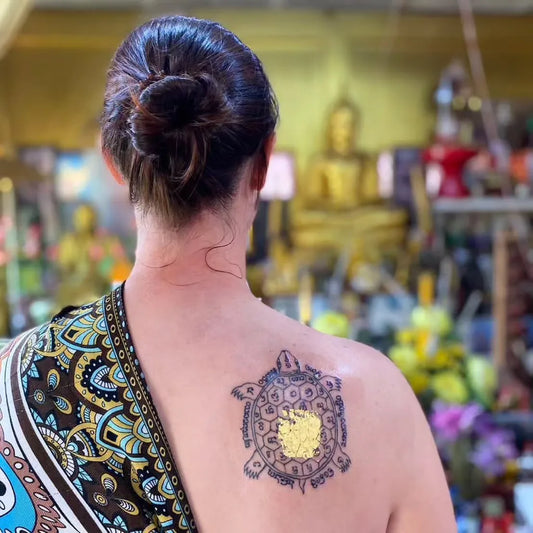 Medium Sak Yant Turtle Tattoo on Women Back by @sakyantchiangmai