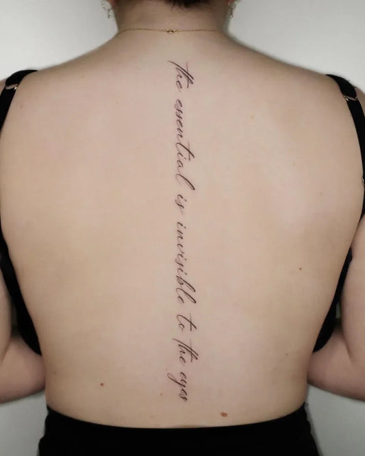 Medium Script Text Quote Tattoo on Women Back by @tattooist_marco