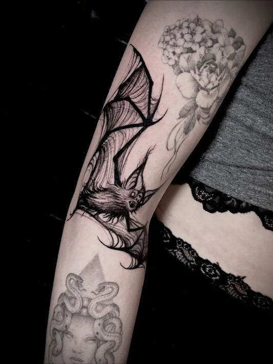 Medium Sketch Bat and Rose Tattoo on Women Arm by @rosannevanspaendonck