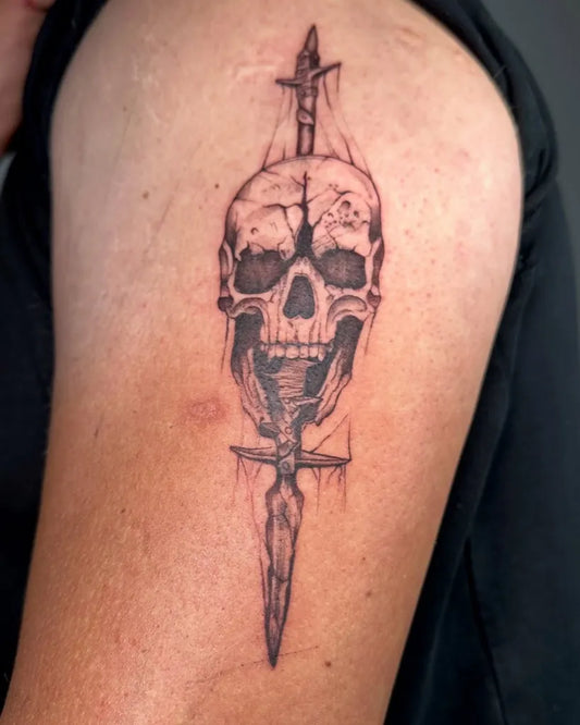 Medium Skull and Dagger on Men Arm Tattoo by @strzel.sobie.dziarke