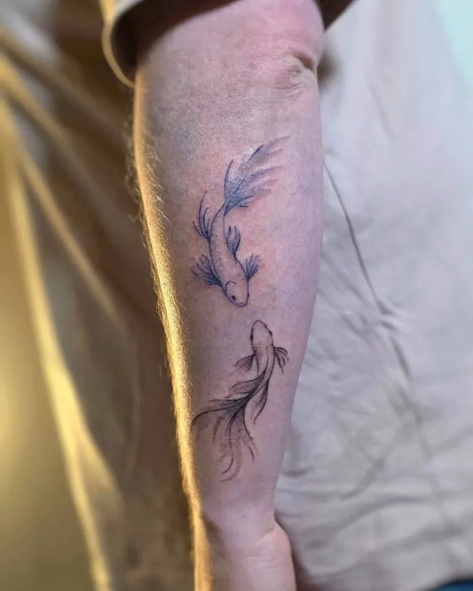 Medium Stick and Poke Two Koi Fish Tattoo on Men Arm by @gringo.pox