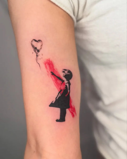 Medium Street Art Girl with Heart Balloon on Women Arm Tattoo by @zealous_ink