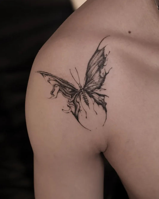 Surrealism Butterfly on Men Shoulder Tattoo by @spooy.w