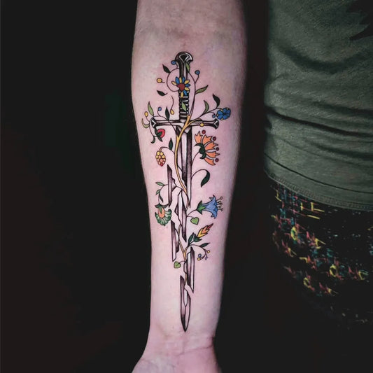 Medium Tolkien Floral Narsil Anduril Sword with Flowers on Women Arm Tattoo by @vividflora.ink