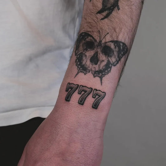 Medium Traditional 777 Tattoo on Men Forearm by @inking.housewife