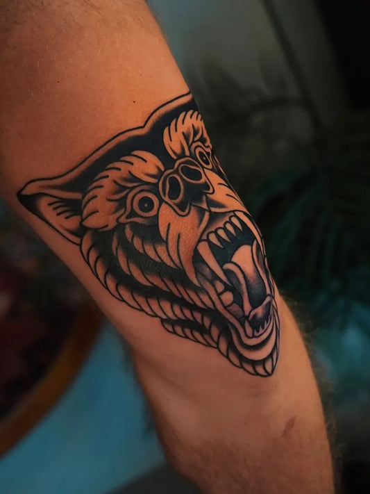 Medium Traditional Bear Head on Men Arm Tattoo by @figtree.tattoo.studio