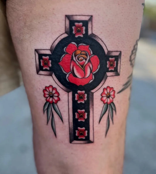 Medium Traditional Cross with Rose on Men Thigh Tattoo by @memorialtattooatl