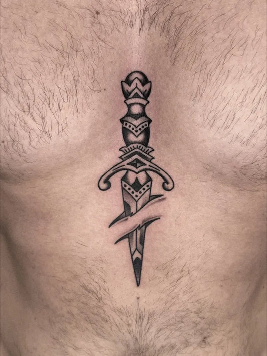 Medium Traditional Dagger Tattoo on Men Chest by @dannybrinktattoo