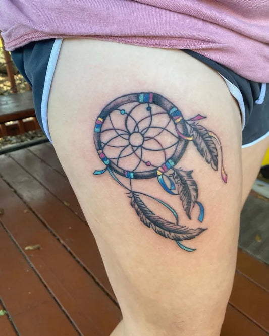 Medium Traditional Dream Catcher with Feathers Tattoo on Women Thigh by @kelleyallentattoo