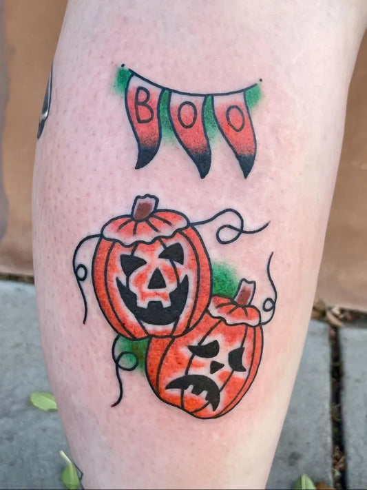 Medium Traditional Halloween Pumpkins Banner Tattoo on Women Thigh by @budwizzo