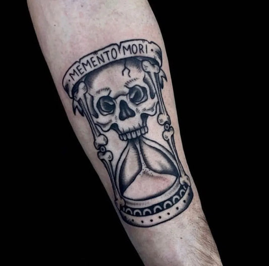 Medium Traditional Memento Mori Hourglass Skull on Men Arm Tattoo by @the.electric.tattoo